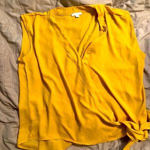 Mustard sleeveless blouse
